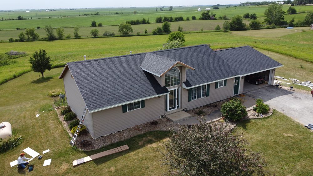 Completed roof replacement on a home by Trego Roofing