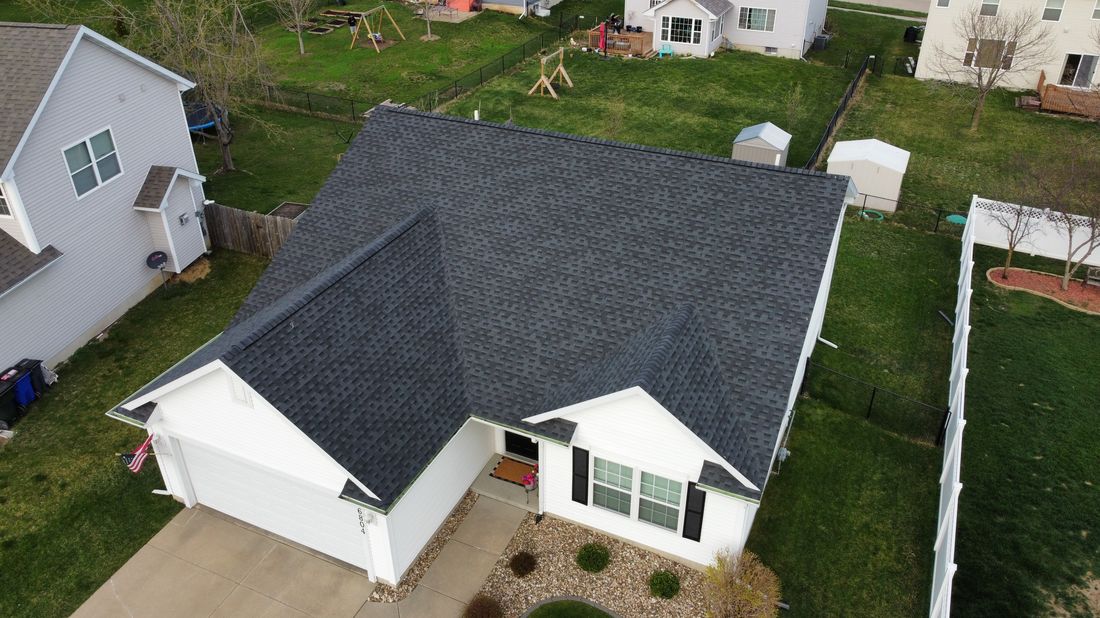 Aerial view of a completed roof installed by Trego Roofing