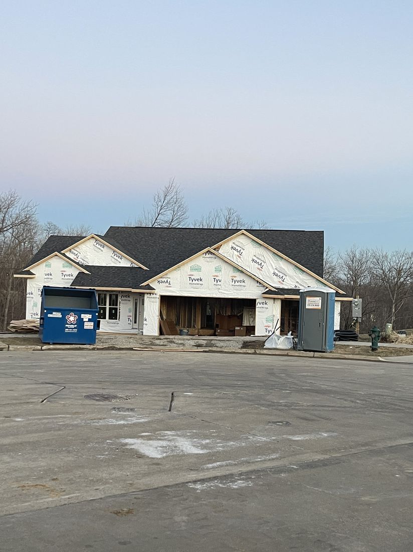 New construction home during roofing work