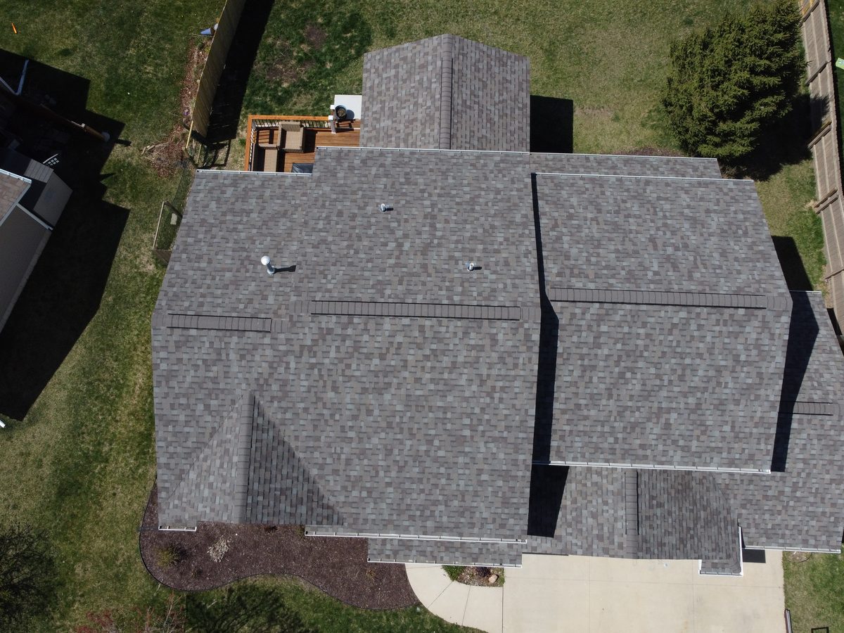 Aerial drone view of a completed roof by Trego Roofing in the Cedar Rapids, Iowa area