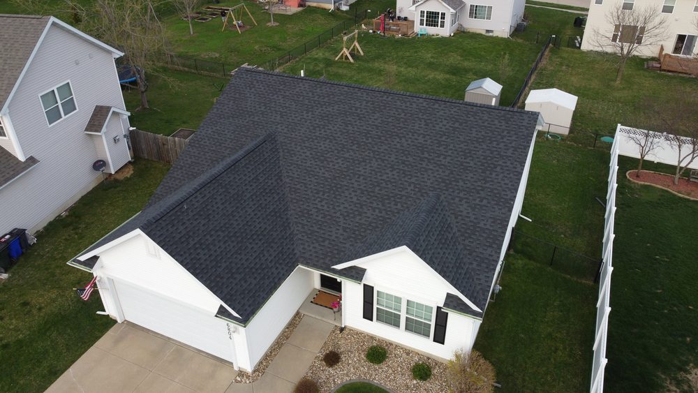 Aerial close-up of a finished roofline completed by Trego Roofing