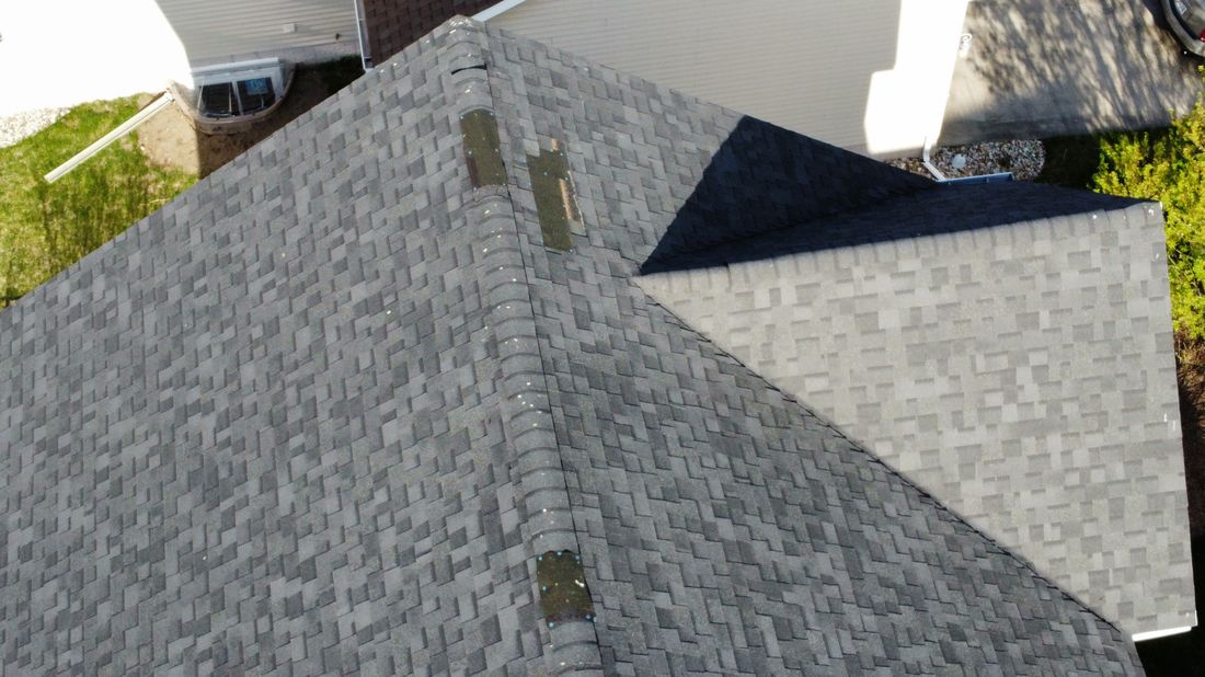 Aerial close-up detail of a roof ridge line inspected by Trego Roofing