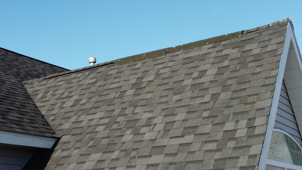 Aerial detail of a roof ridge line, Trego Roofing project