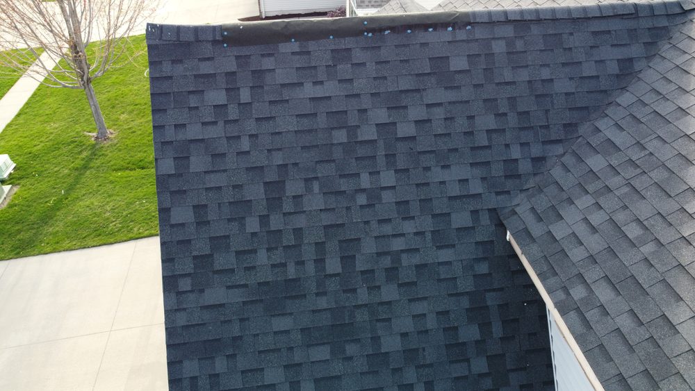 Close-up of dimensional shingle roofing installed by Trego Roofing