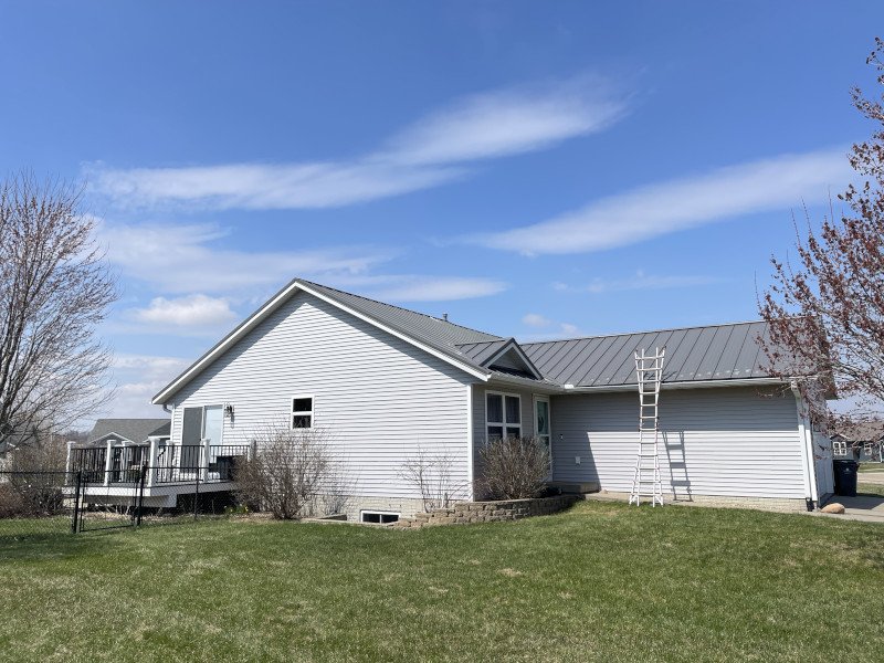 Completed standing seam metal roof installed by Trego Roofing